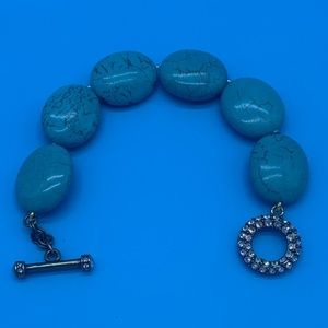 Heidi Daus turquoise color bead bracelet 7 1/2’ in length.